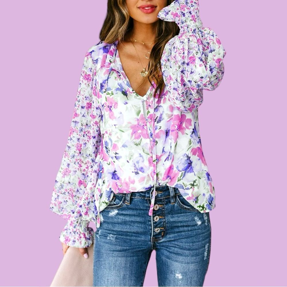 Pretty new white long puffy sleeve blouse with pretty flowers all over design!